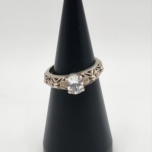 Elegant Sterling Silver Ring with a Dazzling CZ.   Size 8.5. Flower Band. Beauty